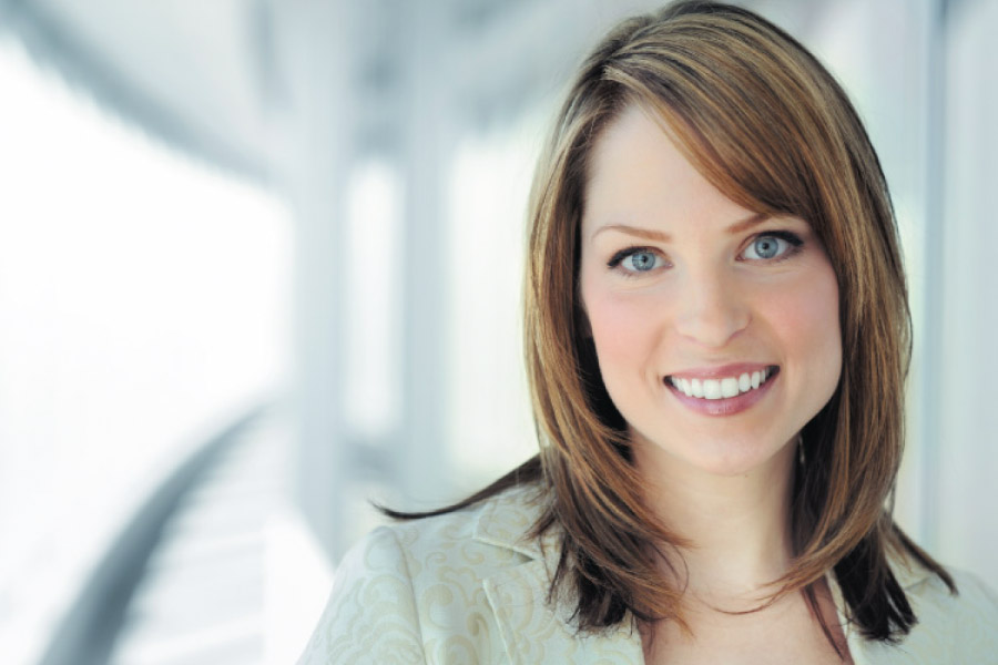 Young professional woman with a beautiful smile.