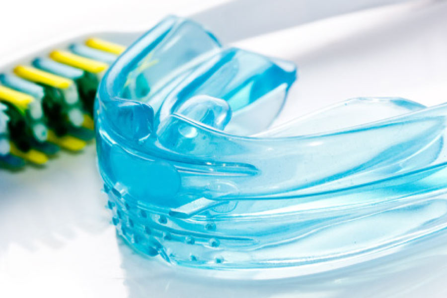 Photo of a mouthguard to protect against sports injuries or bruxism.