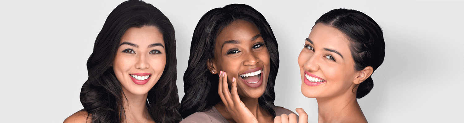 Three young women with beautiful teeth, smiling