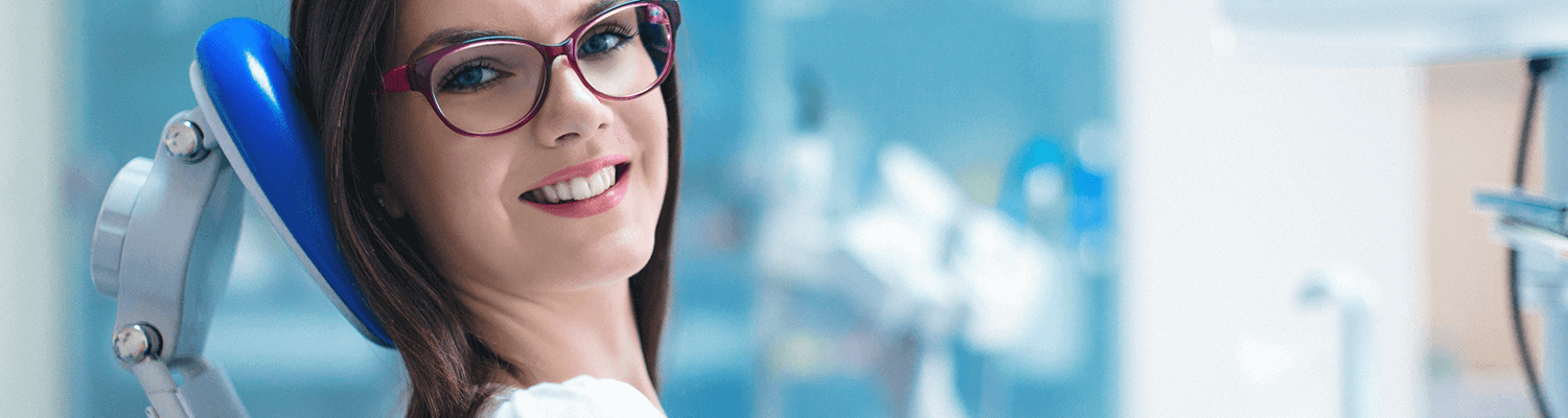 young woman in dental chair