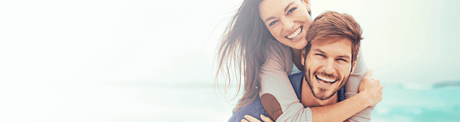 Three young women with beautiful teeth, smiling