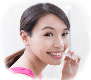 young woman with a whitening tray