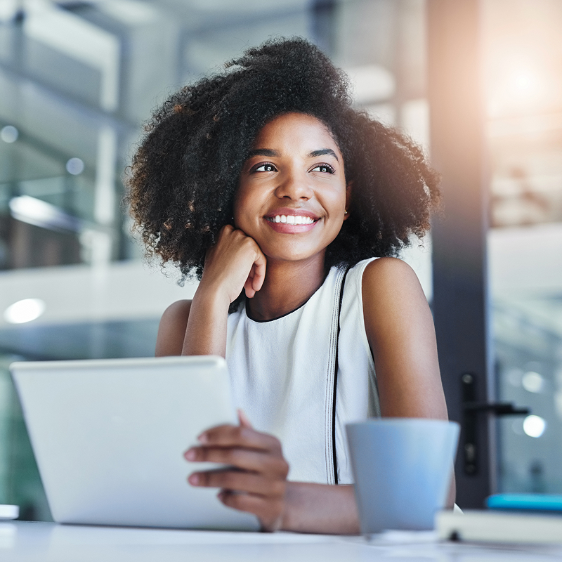 smiling woman with paperwork