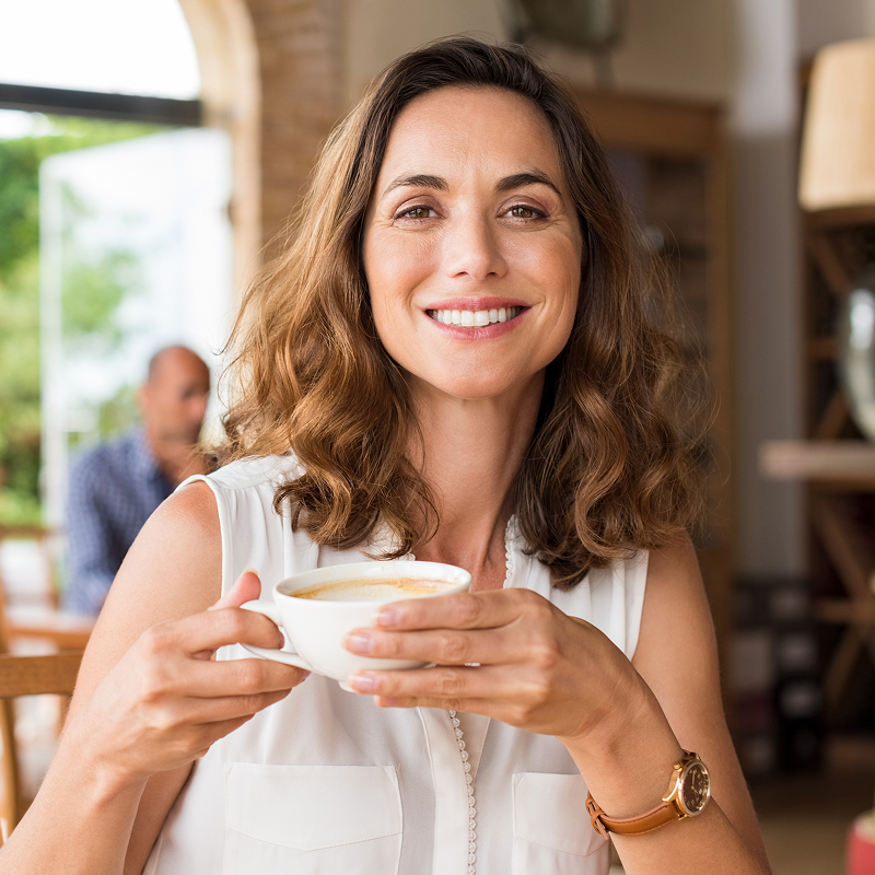 woman having coffee