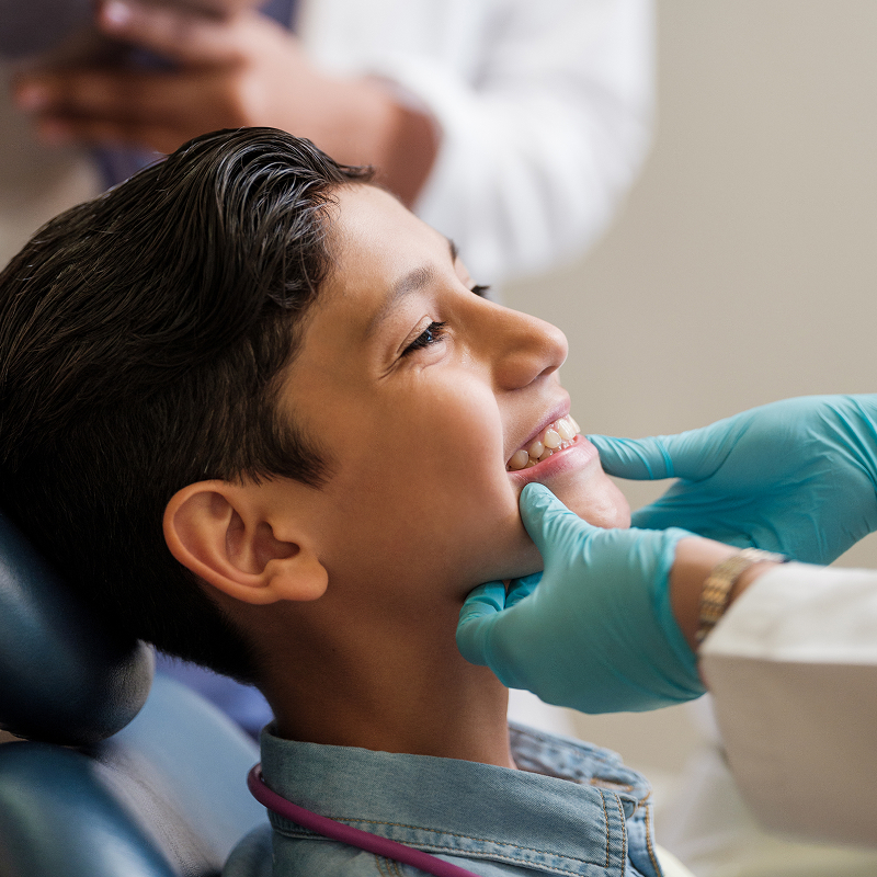 young boy at the dentist