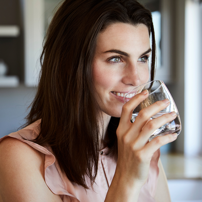 woman drinking a water